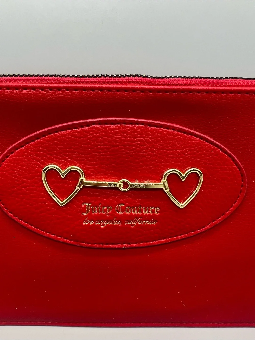 Juicy couture heart to heart wristlet